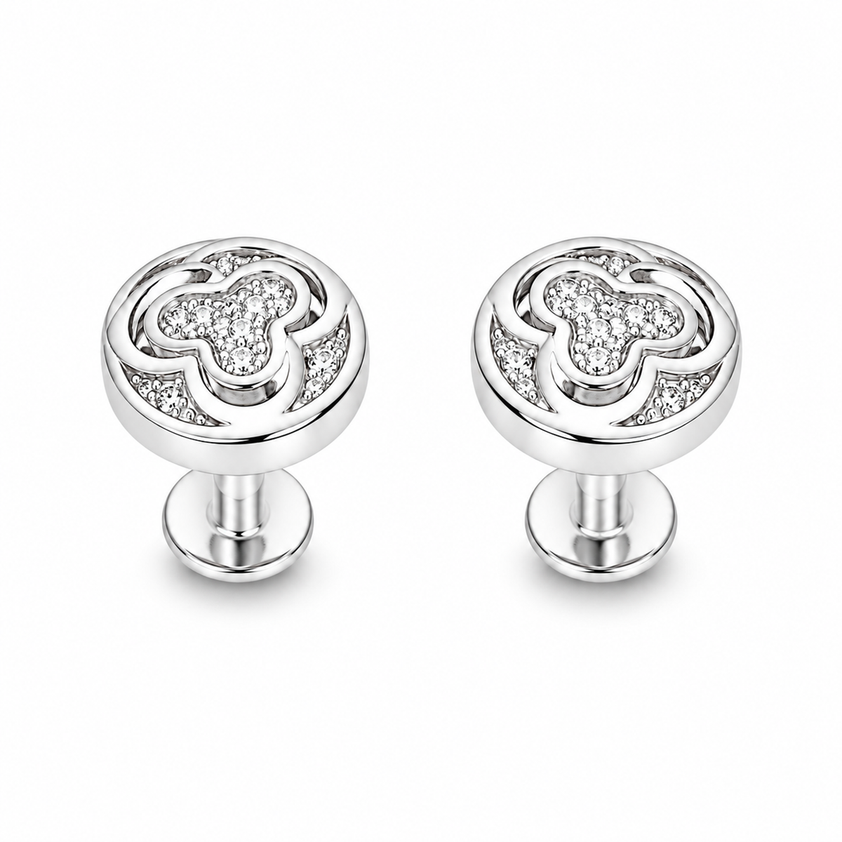 Pair of silver pave swirl stud earrings on a seamless white background