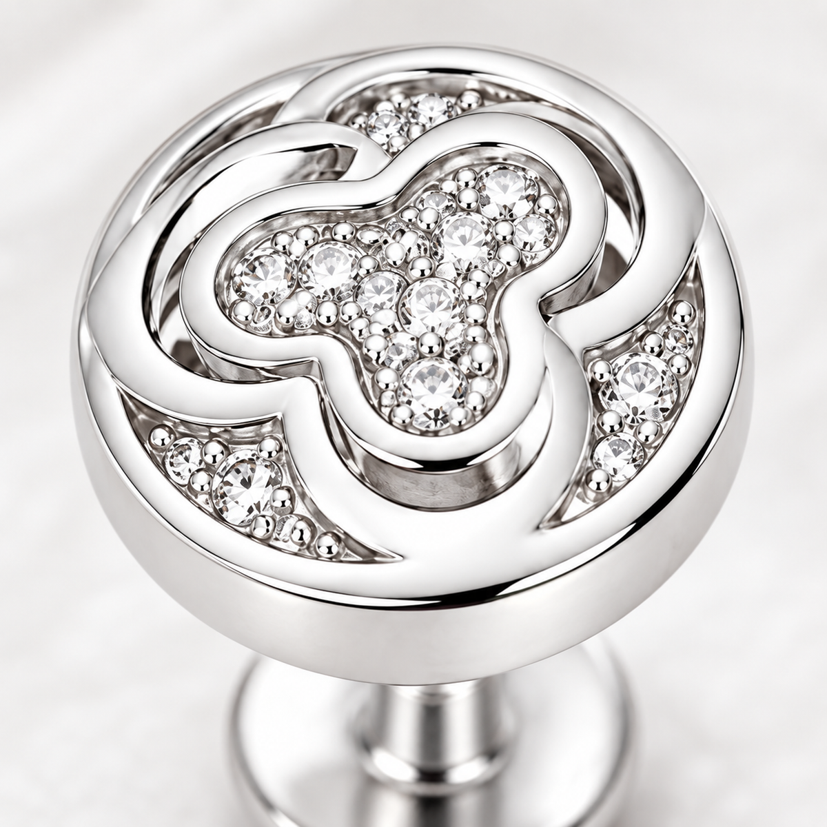 Detailed macro close-up of clear micro pave cubic zirconia setting on silver stud