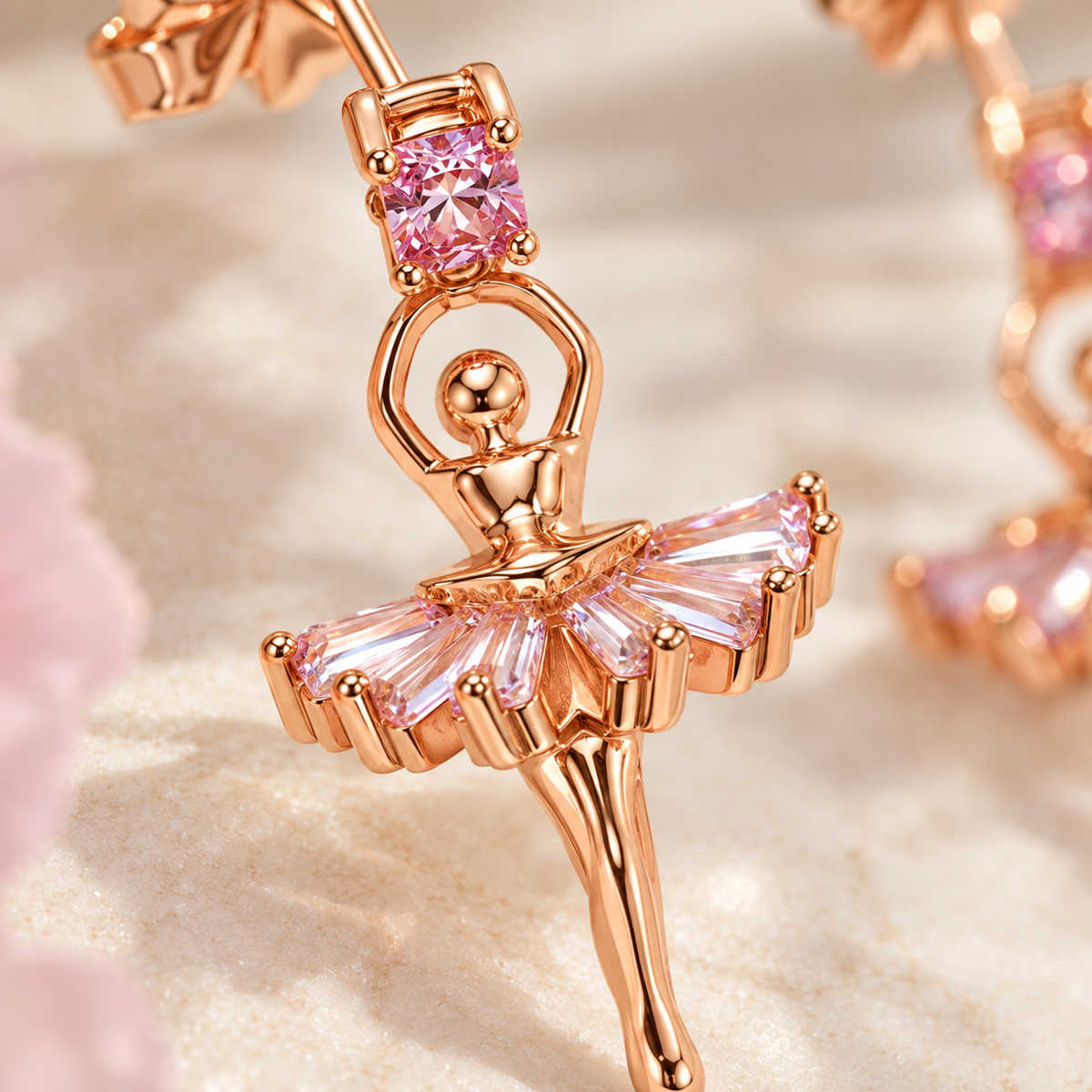 Macro detail shot showing the intricate stone setting of a ballerina drop earring.