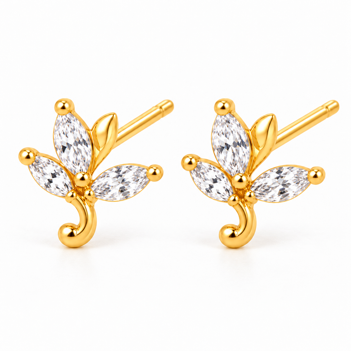 Pair of gold-plated marquise leaf stud earrings on a seamless white background.