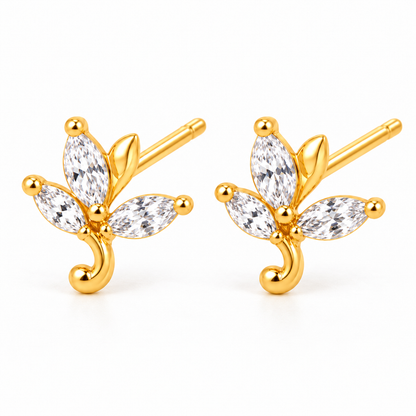 Pair of gold-plated marquise leaf stud earrings on a seamless white background.