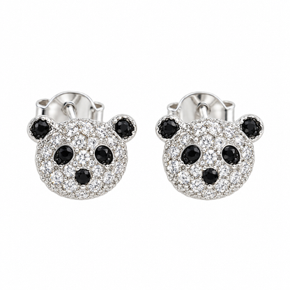 Pair of sterling silver panda stud earrings with clear and black cubic zirconia on a white background.