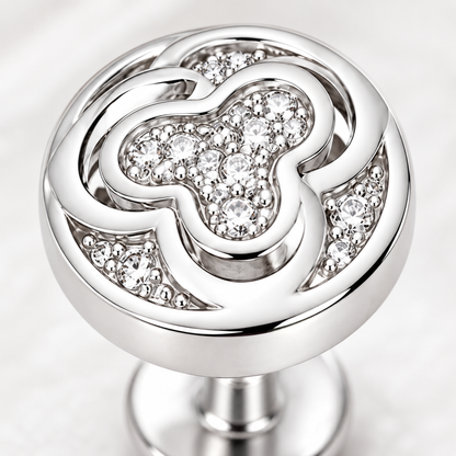 Detailed macro close-up of clear micro pave cubic zirconia setting on silver stud