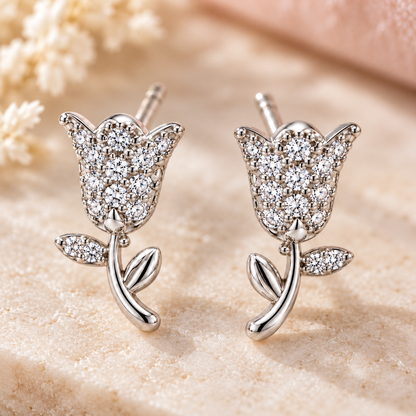 Detailed macro shot of pavé cubic zirconia setting on the silver tulip stud.