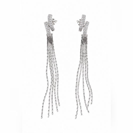 Pair of sterling silver tassel earrings with clear stones displayed against a seamless white background.