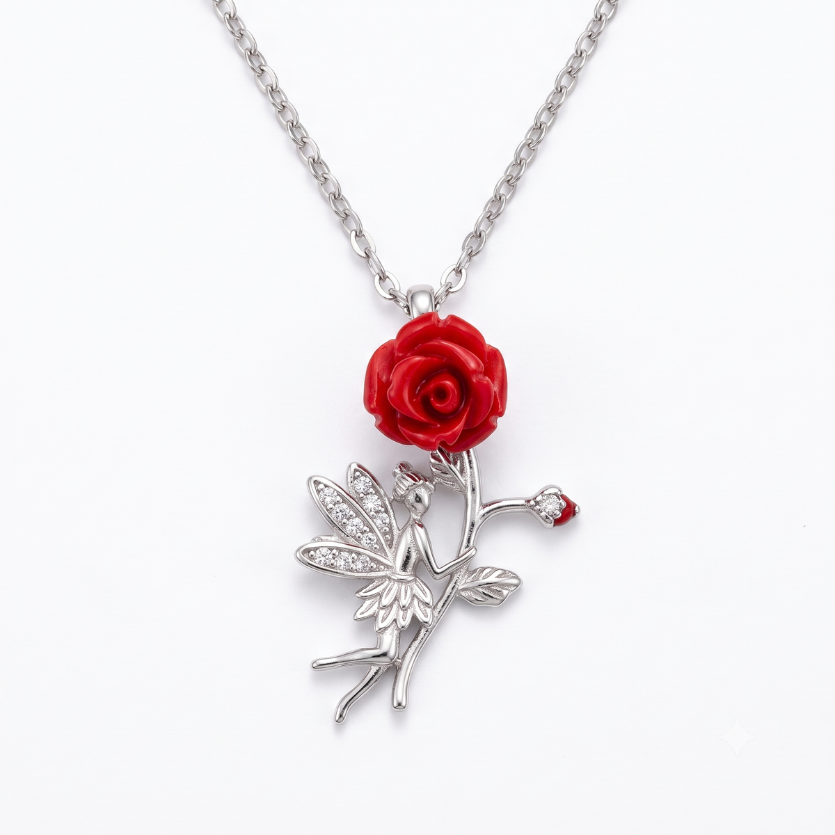 Sterling silver fairy pendant necklace with a red rose, centered on a seamless white background.
