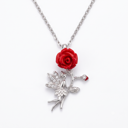 Sterling silver fairy pendant necklace with a red rose, centered on a seamless white background.