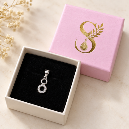 Silver pendant in open pale pink Silvanya gift box with black velvet interior.
