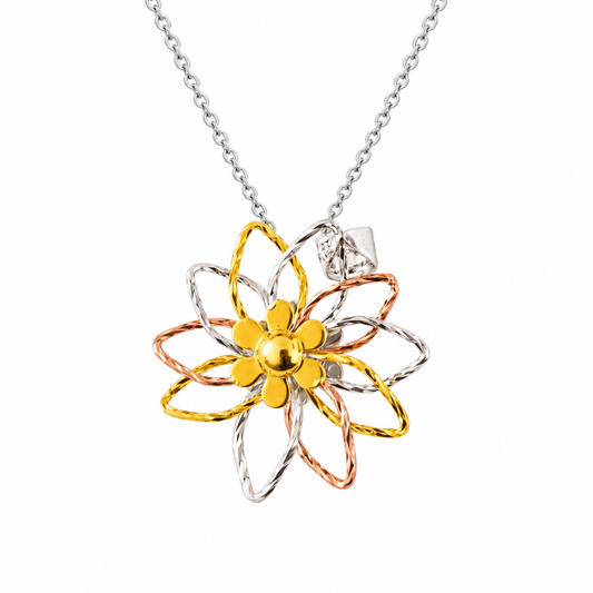 Three-tone floral sterling silver pendant centered on a clean white background.