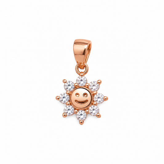 Rose gold smiling sun pendant with cubic zirconia rays on a pure white background.