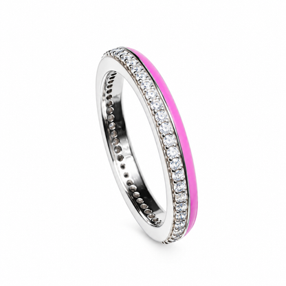Dual-finish silver band with pave cubic zirconia and pink enamel against a clean white background.