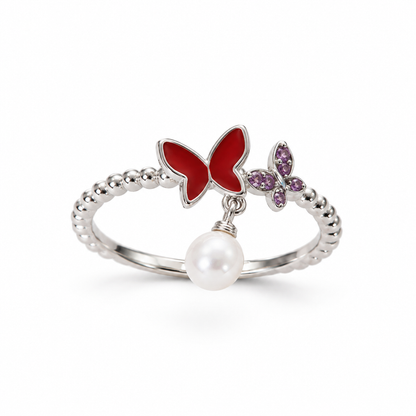 A sterling silver beaded band ring featuring a red butterfly, a purple butterfly, and a dangling white pearl.