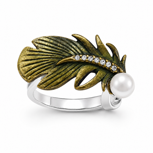 Two-tone sterling silver feather ring with a white pearl on a clean white background.