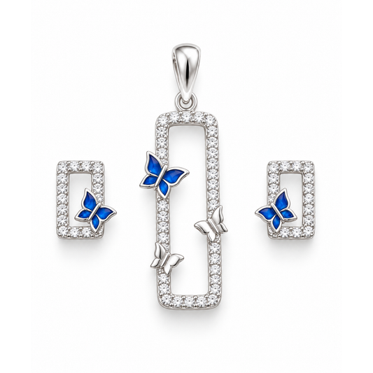Silver rectangular pendant and matching stud earrings set with clear stones and blue enamel butterfly accents on white background.