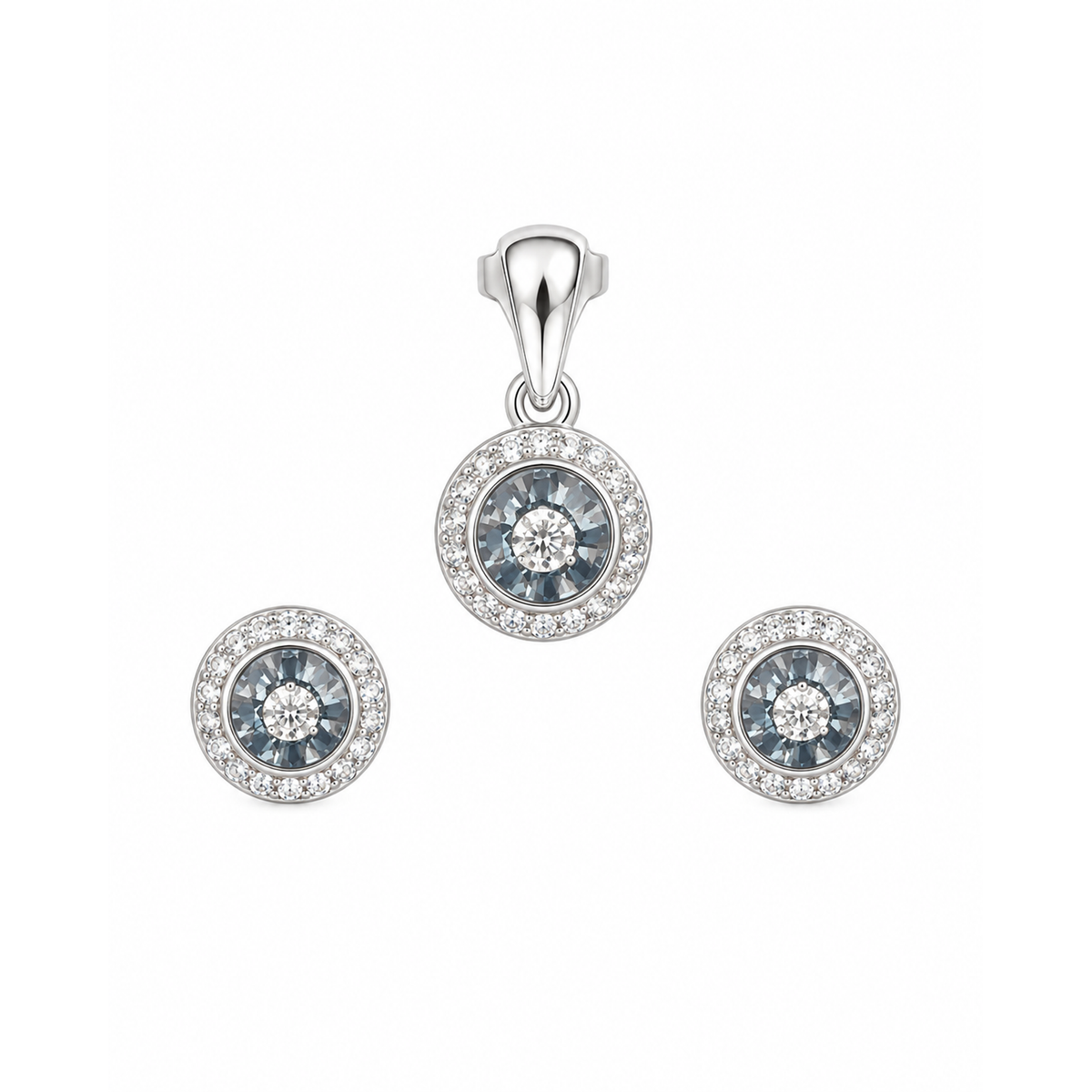 Jewellery set presented on a seamless white surface in even studio light.