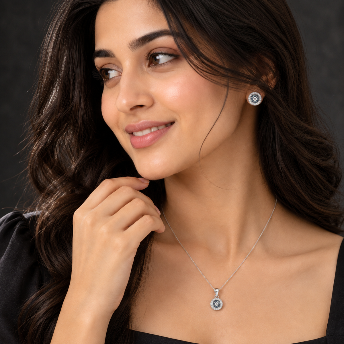 Close-up of Noya wearing the matching necklace and stud earrings set.
